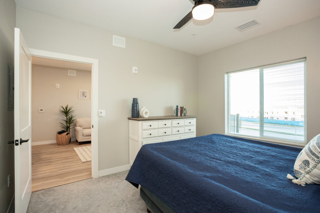 Another view of a bedroom in a two bedroom apartment.